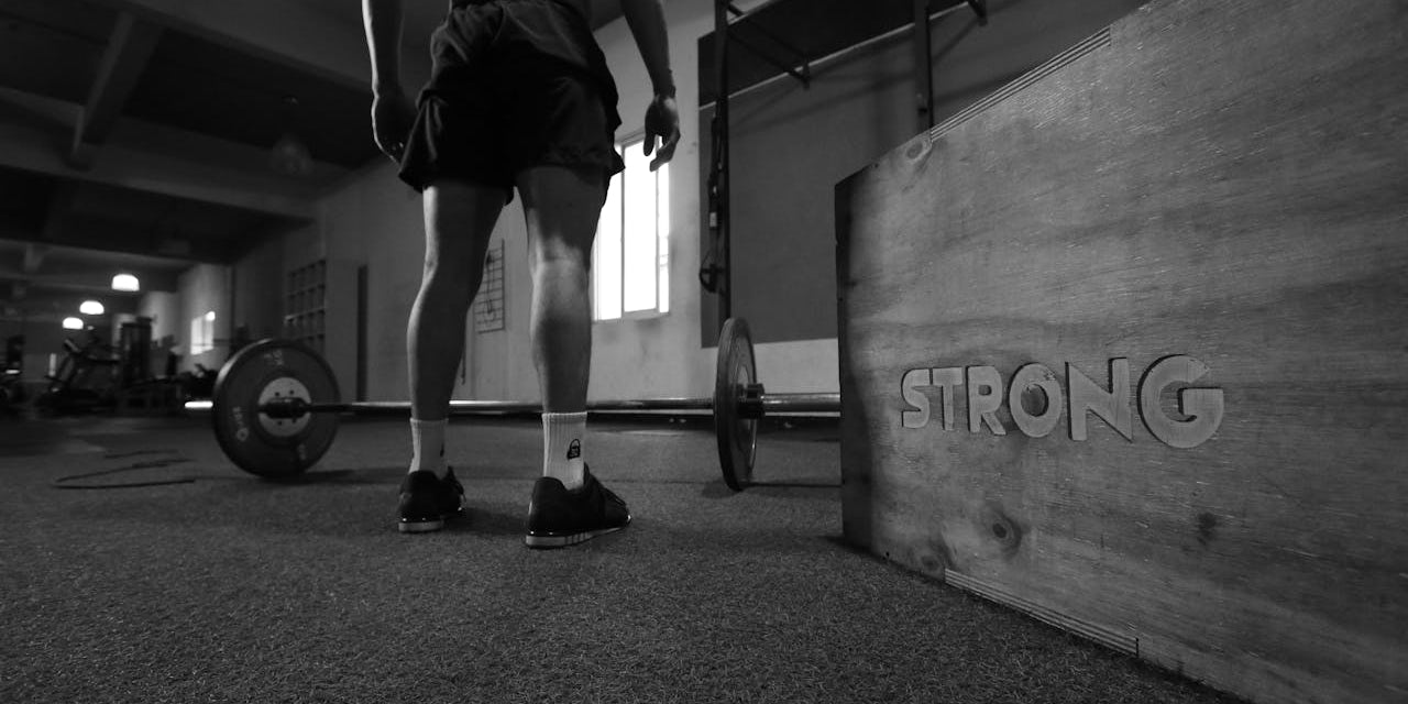 Strength Training for Beginners: Building a Solid Foundation. Photo by Estudio Polaroid